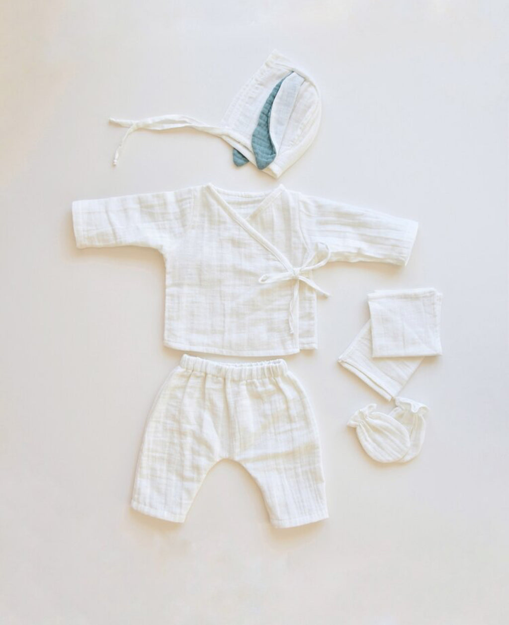 Muslin newborn set | Biologisch katoen | Blauwe oortjes | 4-delig