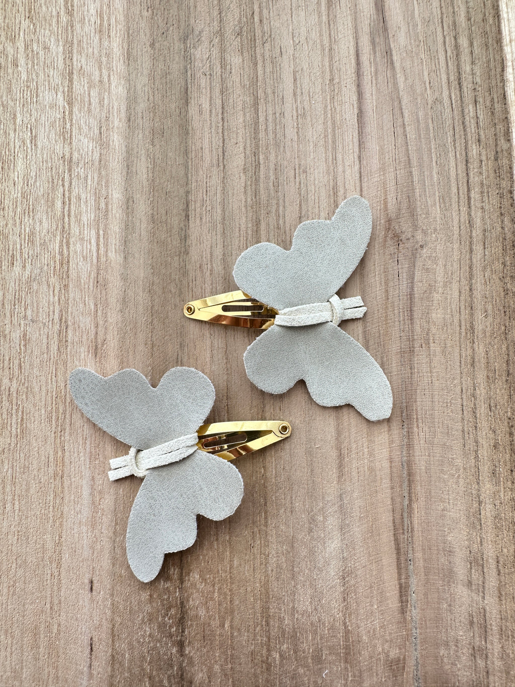 Vlinder - Suède beige